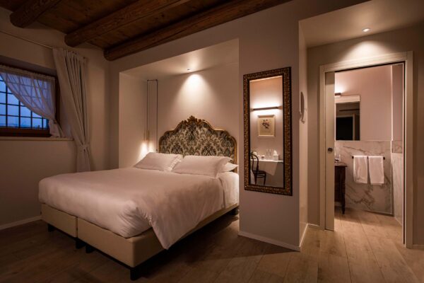 camera_letto_hotel_magari-600×400